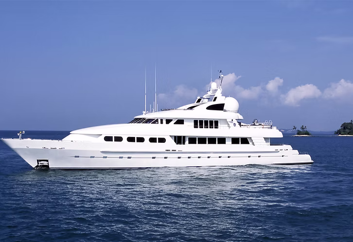 Coated motor yacht at sea